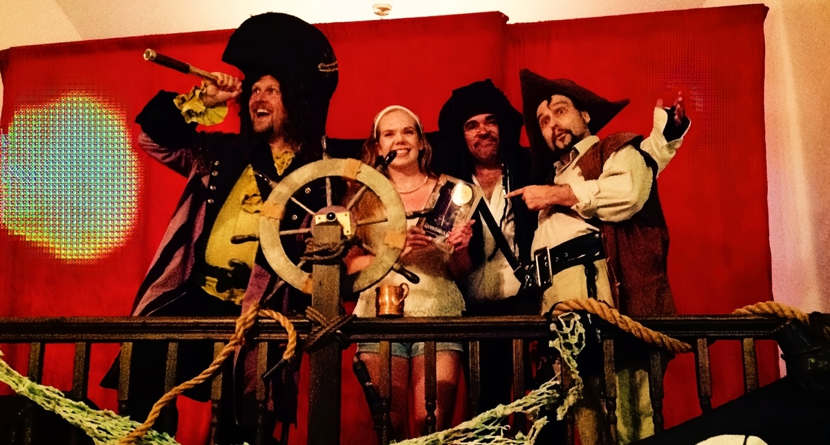 Wacky actors performing a pirate-themed murder mystery in New Castle, DE