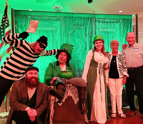 Final reveal of the culprit during a high-energy Irish pub-themed murder