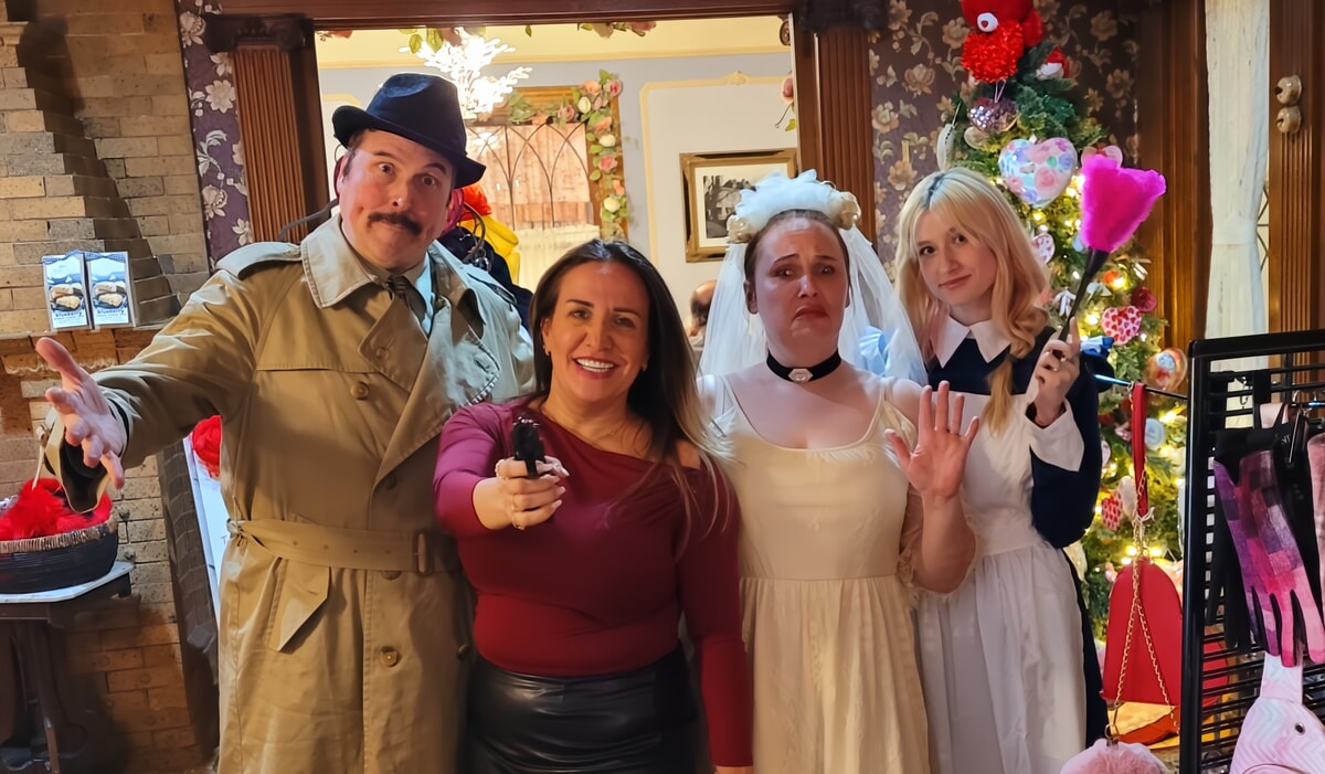 Actors in Parisian attire perform a captivating French-themed murder mystery