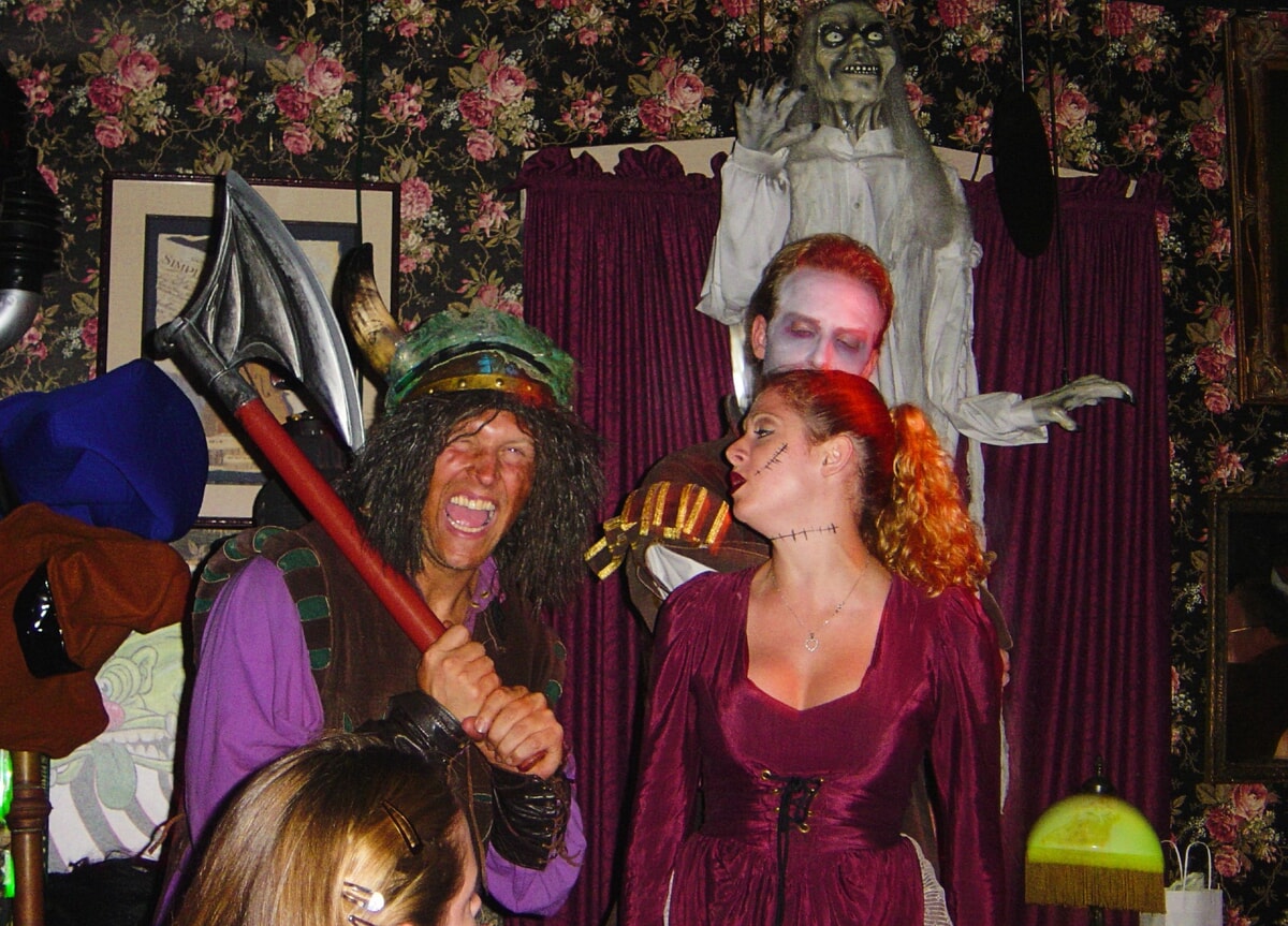 Actors dressed as zombies perform a thrilling murder mystery dinner show