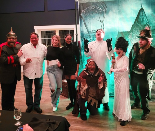 Costumed characters reenact a spooky Frankenstein Halloween murder mystery