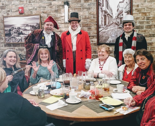 Ebenezer Scrooge investigates a holiday-themed murder mystery